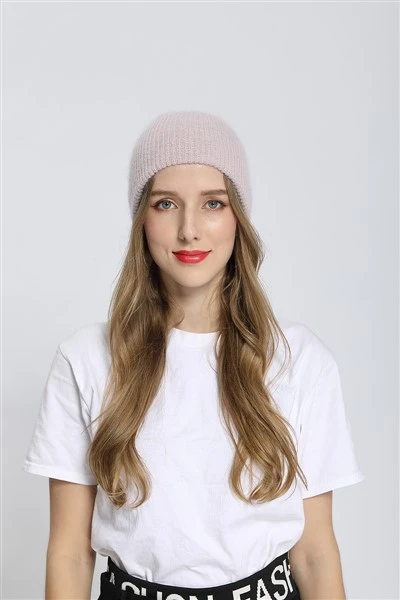 Megzta kepurė su kailiu Pom Pom